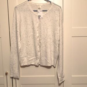 White cardigan with black and grey specks